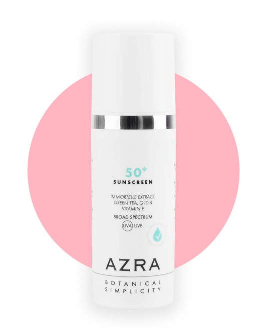 AZRA Sunscreen SPF50+ – krema za zaštitu od sunca 50 ml na ružičastoj podlozi